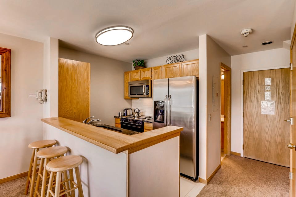 Condo, 2 Bedrooms | Private kitchen | Coffee/tea maker, full-size fridge, microwave