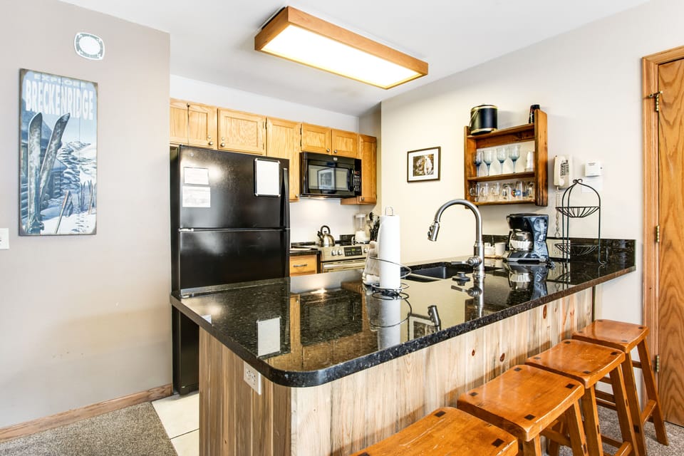 Condo, 1 Bedroom | Private kitchen | Coffee/tea maker, full-size fridge, microwave