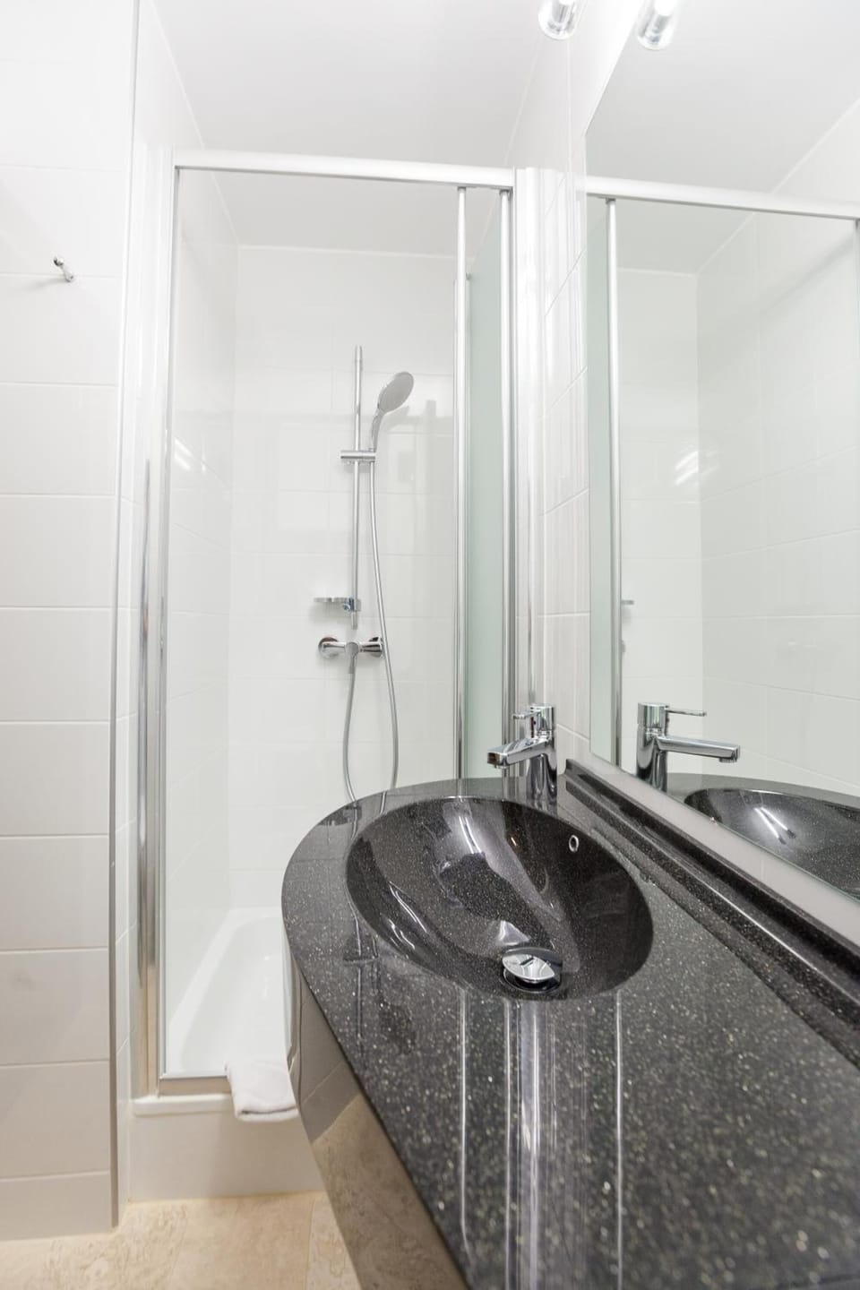 Shower, free toiletries, hair dryer, towels