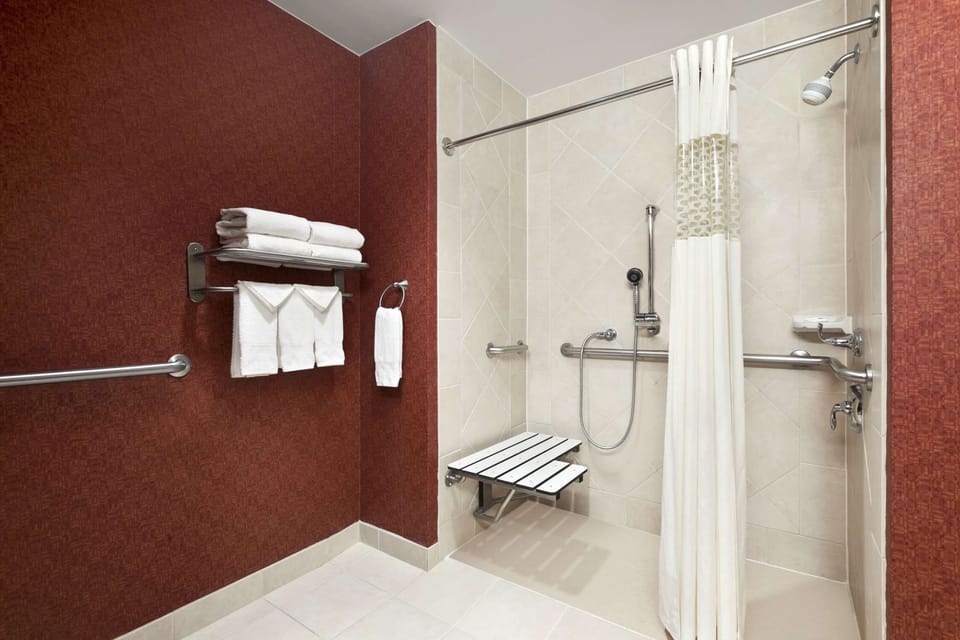 One King Bed, Non-Smoking, Accessible | Bathroom | Hair dryer, towels
