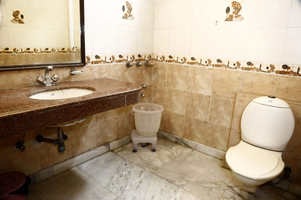 Shower, free toiletries, slippers, towels
