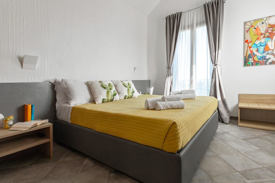 Panoramic Quadruple Room, Balcony, Sea View | Minibar, in-room safe, desk, blackout drapes