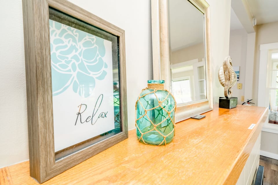 Charming beach decor throughout this updated bungalow!