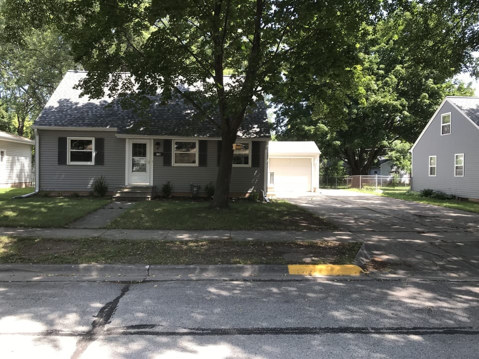 View of house from street. Brand new roof and siding.