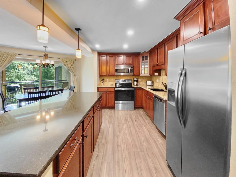 Condo, 2 Bedrooms | Private kitchen | Fridge, microwave, oven, dishwasher