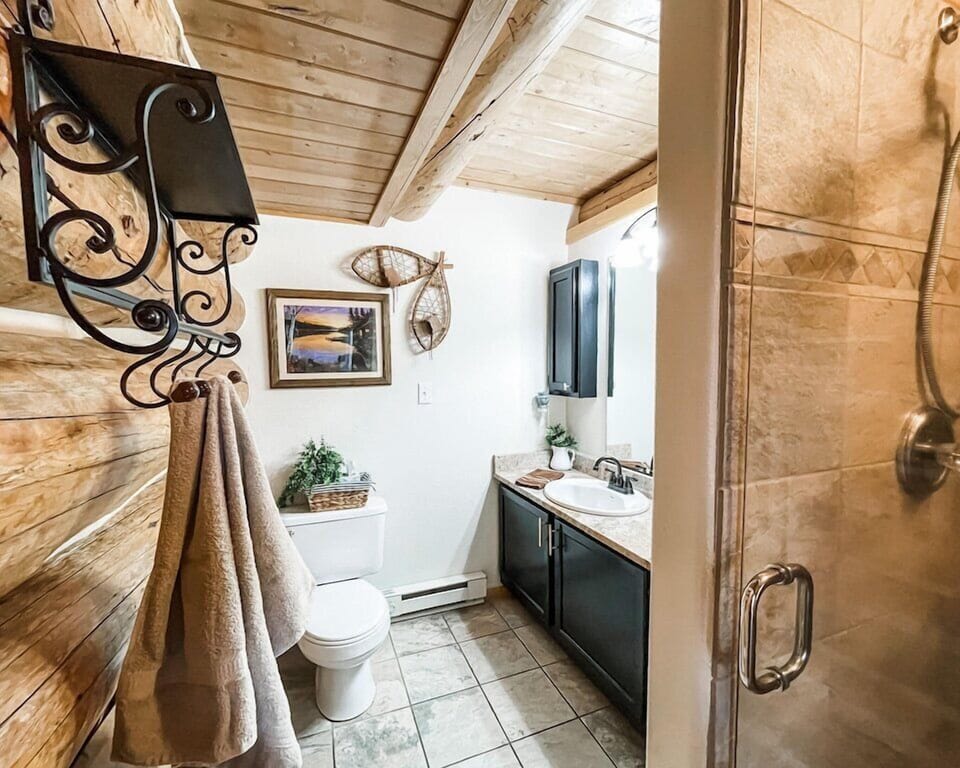 Attached master bath has a large tile shower 