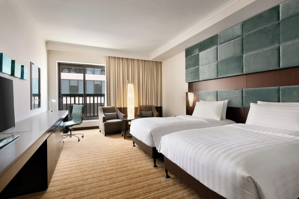 Premium bedding, down comforters, pillowtop beds, minibar