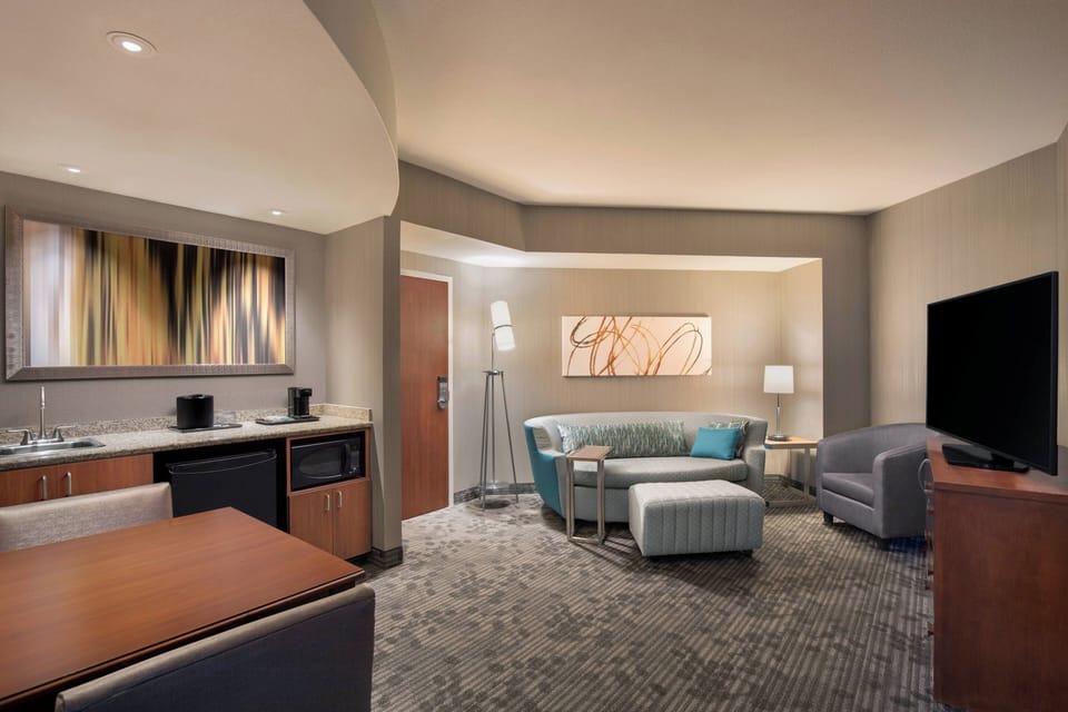 Suite, 1 Bedroom, Allergy Friendly (pure) | Living room | 55-inch LCD TV with satellite channels, TV