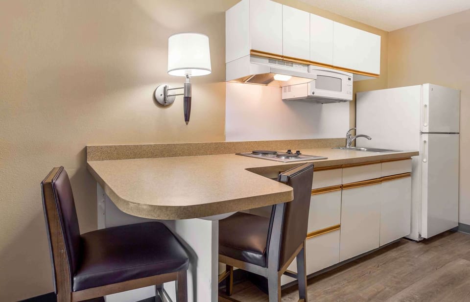 Full-size fridge, microwave, stovetop, coffee/tea maker