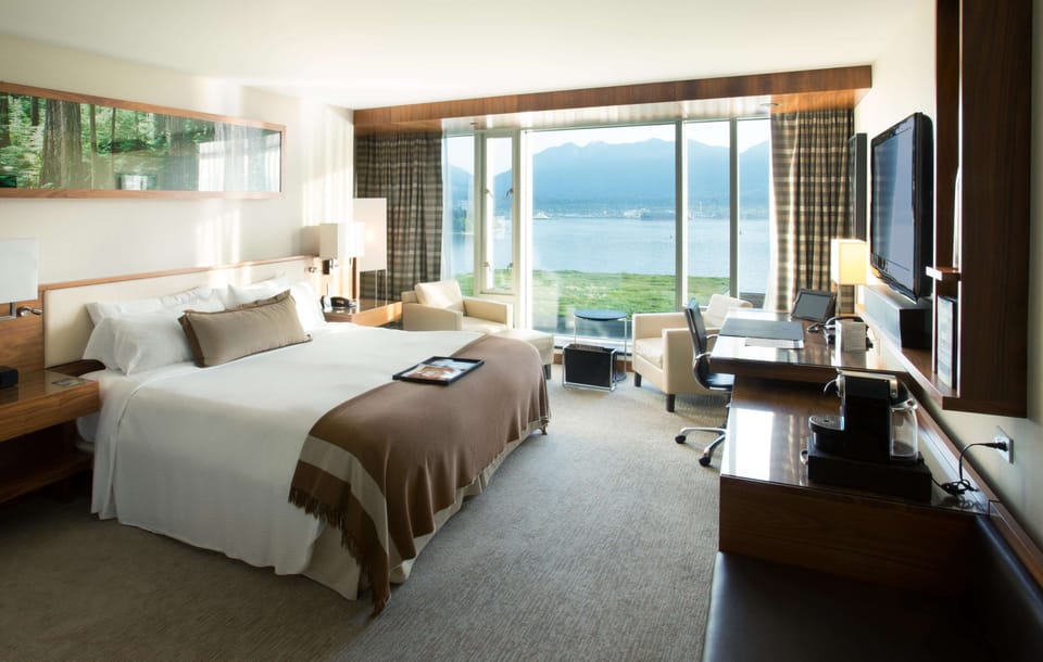 Premium bedding, down comforters, pillowtop beds, minibar