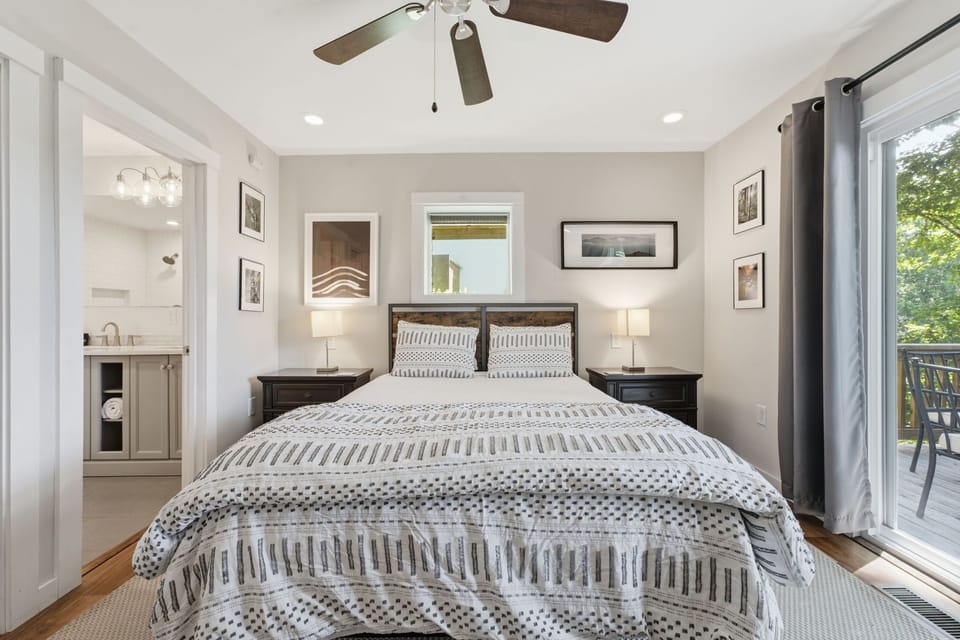 Lower level Primary bedroom with queen bed. 