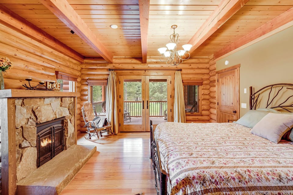 Unwind in style—King Bed, fireplace, double shower, soaking tub, and porch.