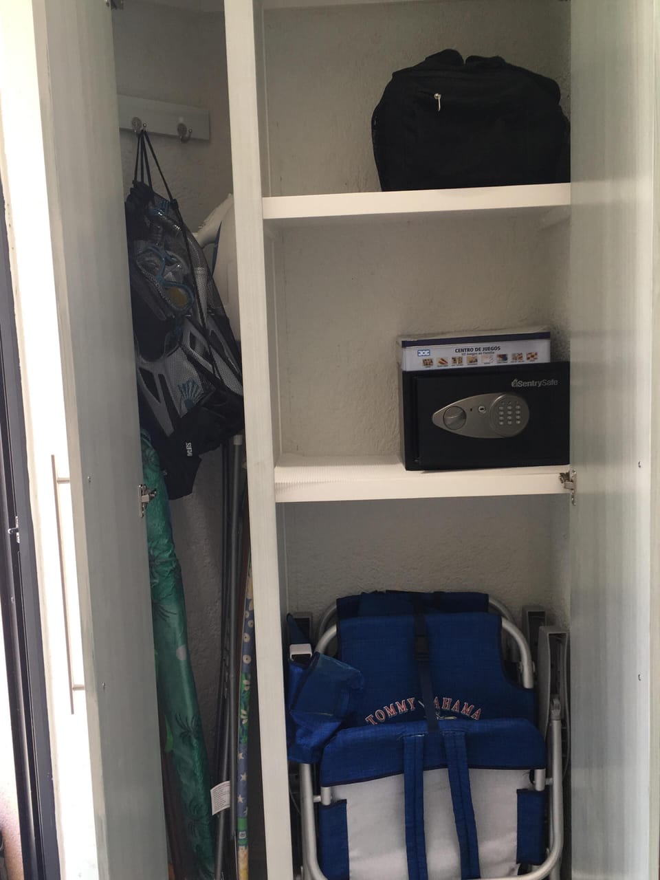 Storage for miscellaneous items, including condo safe