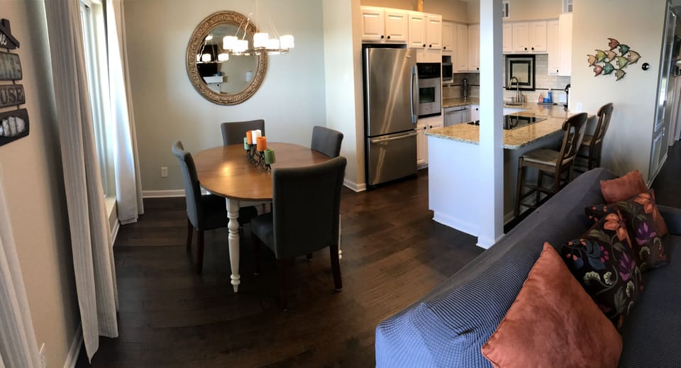 Fully stocked kitchen, four-person dining, two-person bar top.