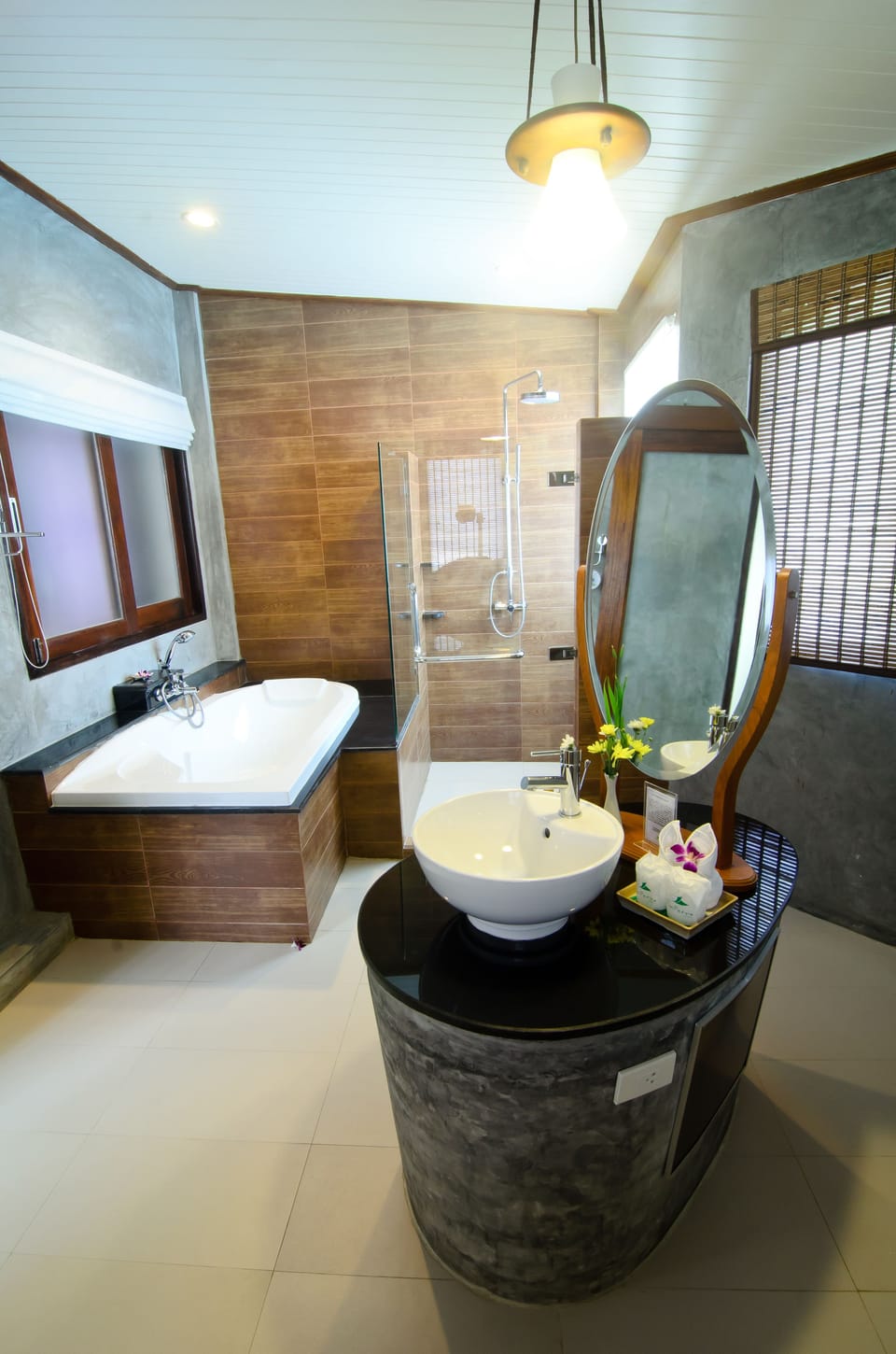 Separate tub and shower, rainfall showerhead, free toiletries