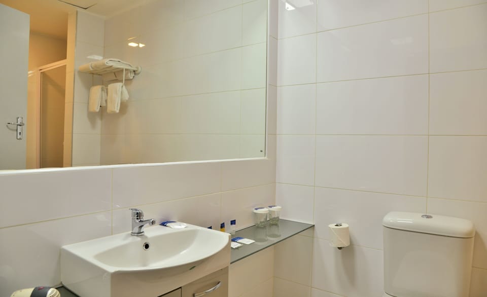 Eco-friendly toiletries, hair dryer, towels