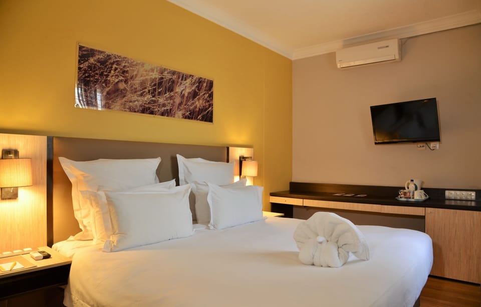 Room, 1 Twin Bed, Garden View | In-room safe, desk, free WiFi, bed sheets