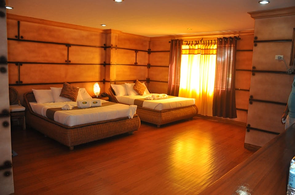 Superior Dalisay | Desk, bed sheets, wheelchair access