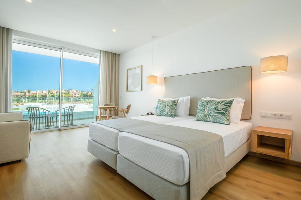 Twin Room, Balcony, Pool View | 1 bedroom, blackout drapes, iron/ironing board, free WiFi