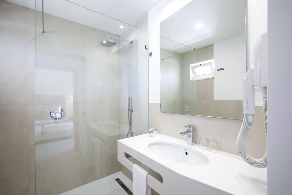 Standard Villa, 1 Bedroom, Terrace, Garden View | Bathroom | Shower, rainfall showerhead, soap, shampoo
