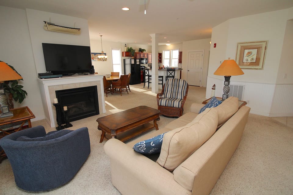 3 bedroom/2 bathroom premium condo | Living area | TV, fireplace, DVD player