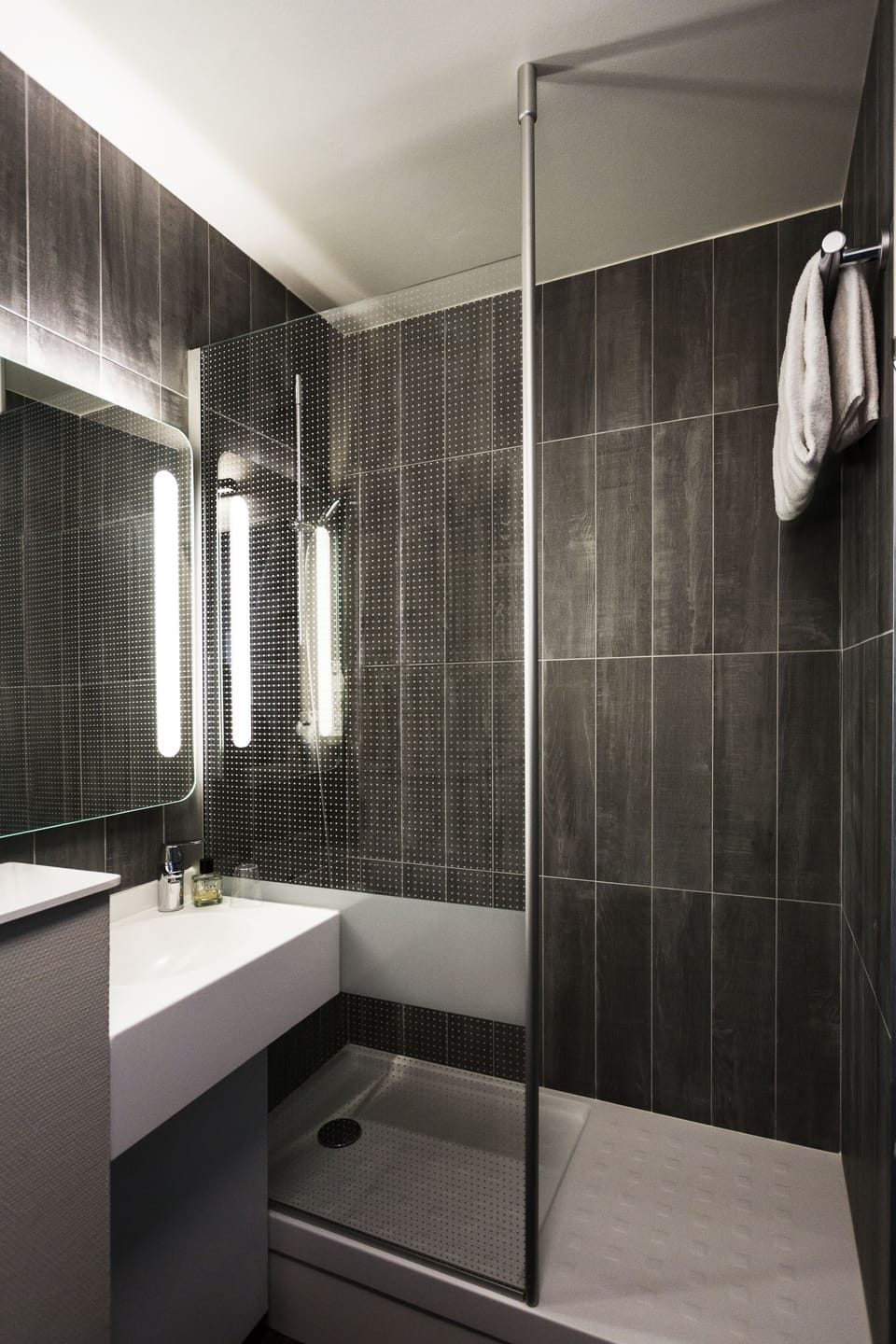 Shower, eco-friendly toiletries, hair dryer, towels