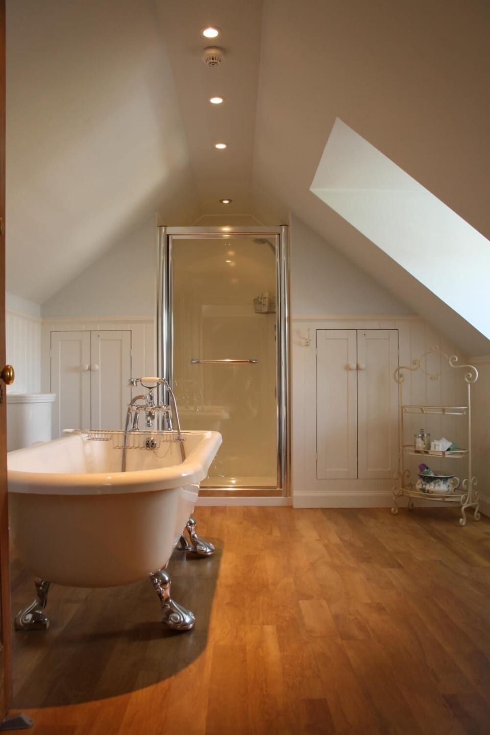 Shower, designer toiletries, hair dryer, bathrobes