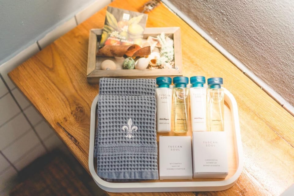 Shower, rainfall showerhead, designer toiletries, hair dryer
