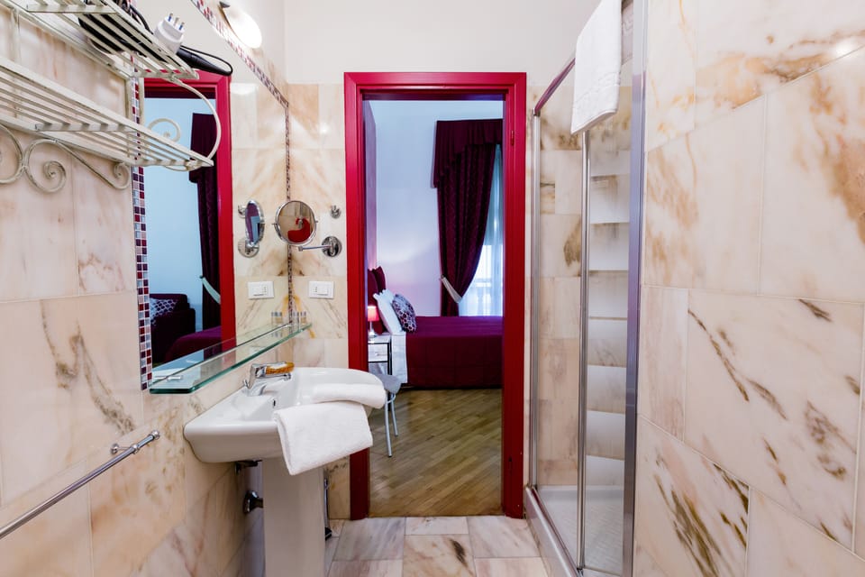 Family Quadruple Room, Non Smoking, Private Bathroom | Bathroom | Shower, free toiletries, hair dryer, bidet