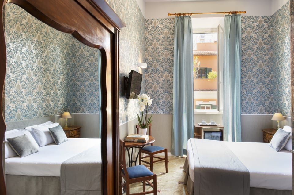 Double or Twin Room | Pillowtop beds, minibar, iron/ironing board, free cribs/infant beds