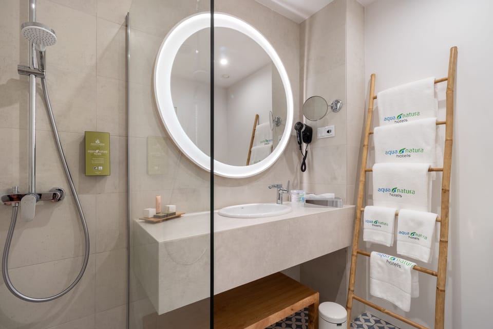 Hair dryer, bathrobes, slippers, towels