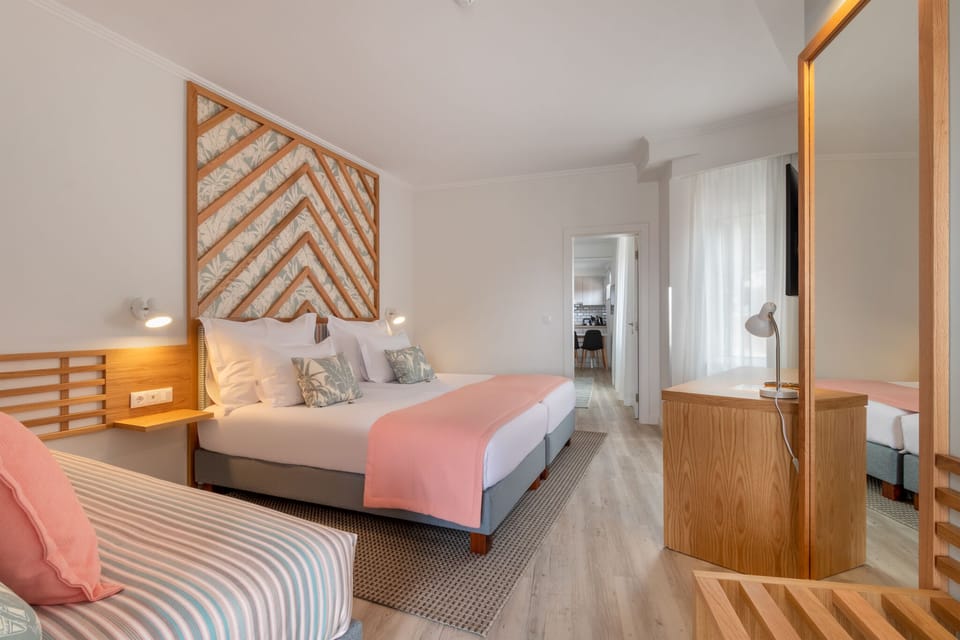 Family Room | Hypo-allergenic bedding available, minibar, in-room safe, desk