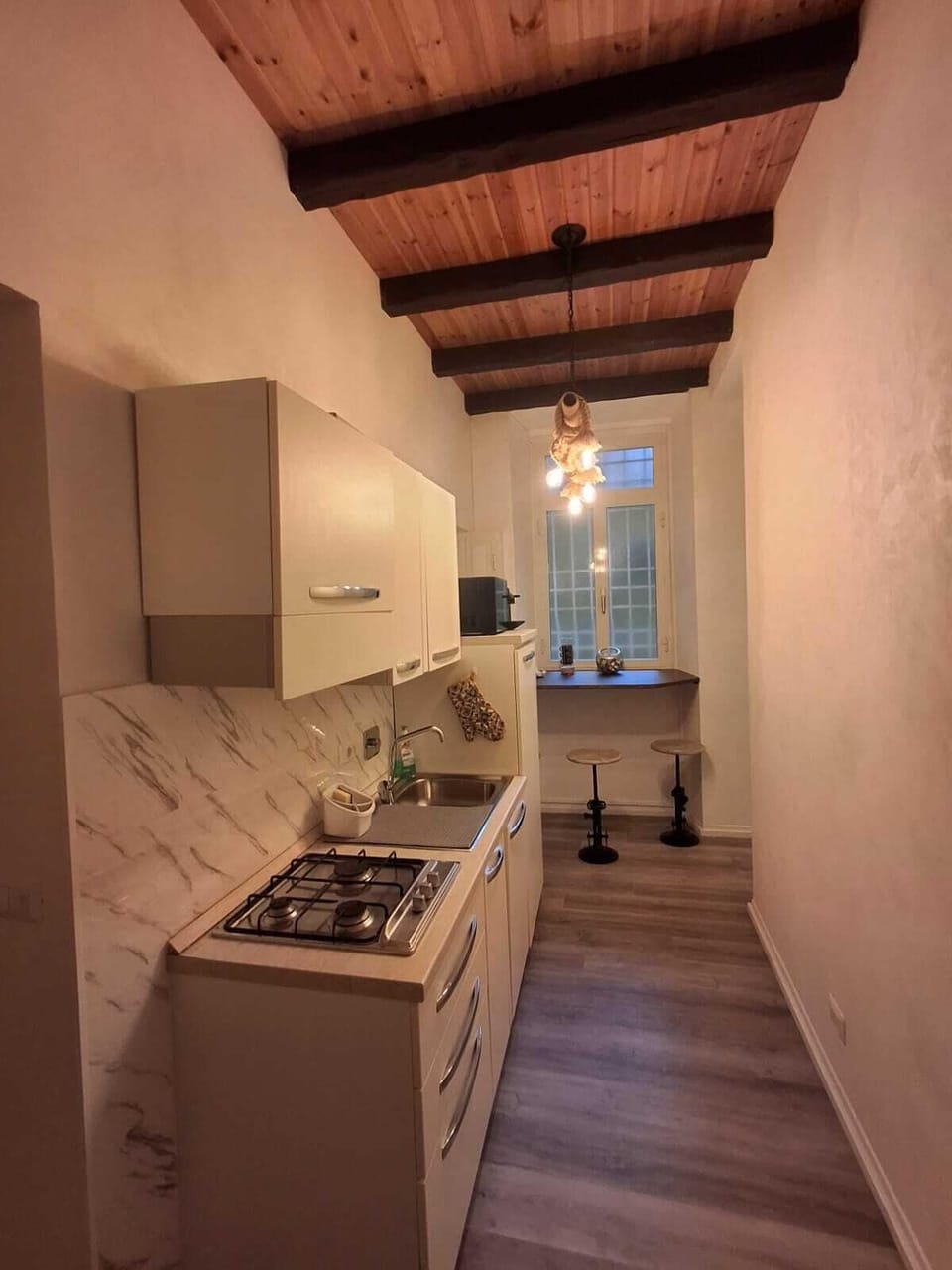 Junior Suite | Private kitchen | Shared fridge, microwave, espresso maker, coffee/tea maker