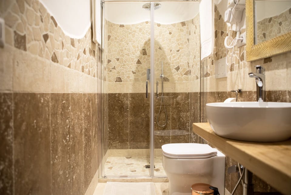 Shower, free toiletries, slippers, bidet