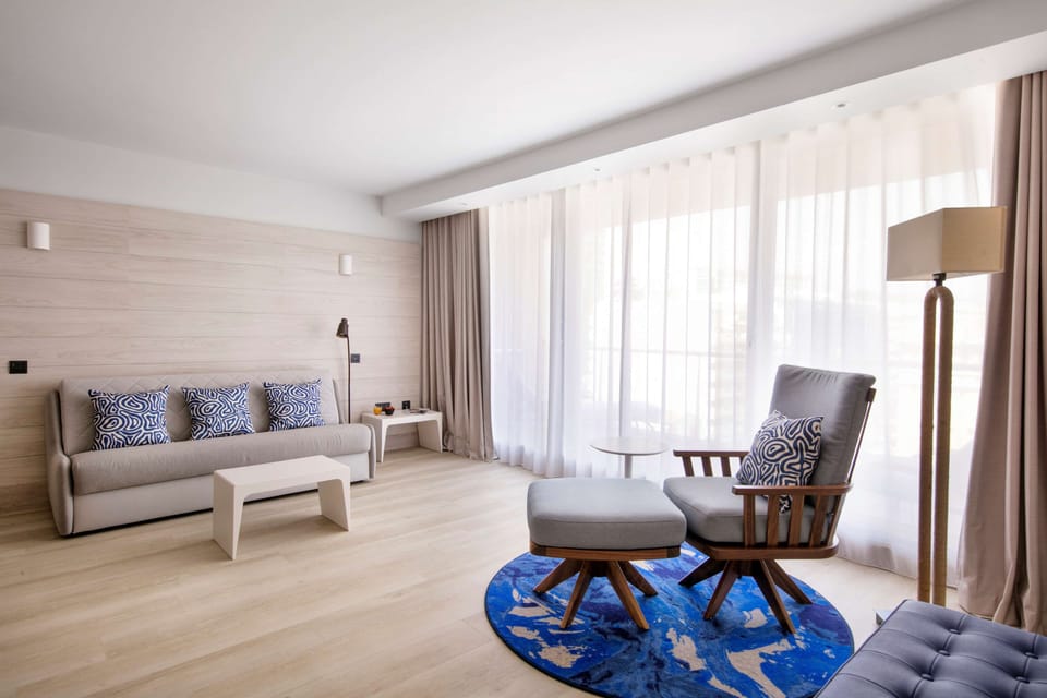 Suite, 1 Bedroom, Terrace, Sea View | In-room safe, desk, laptop workspace, soundproofing