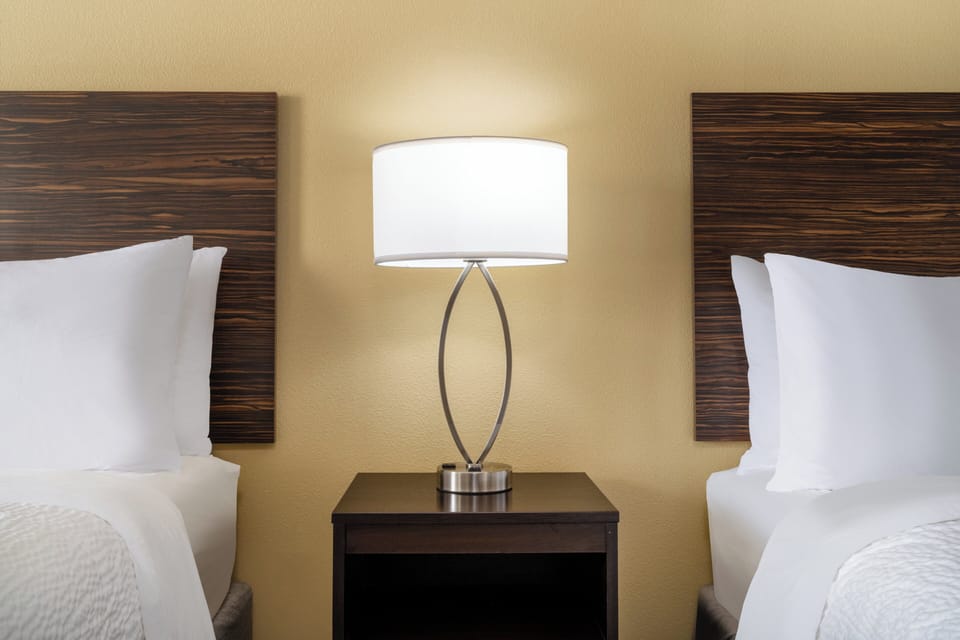 Premium bedding, pillowtop beds, desk, laptop workspace