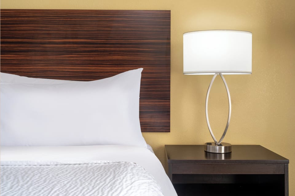 Premium bedding, pillowtop beds, desk, laptop workspace