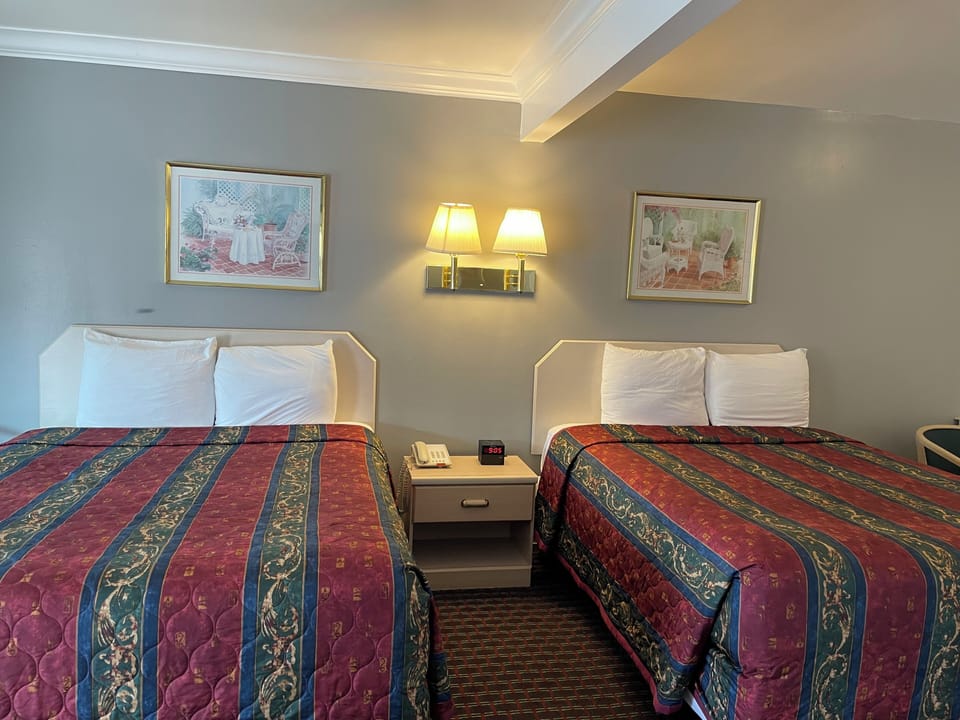 Room, 2 Queen Beds, Non Smoking | Bathroom | Shower, towels