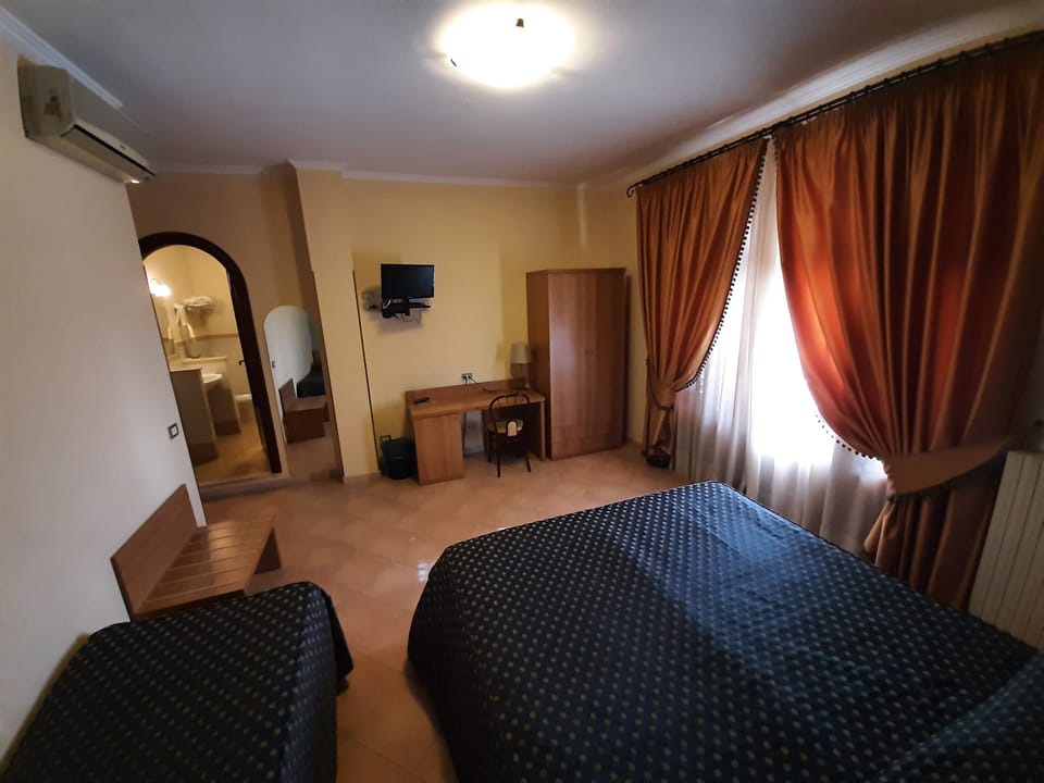 Standard Triple Room | Minibar, in-room safe, desk, free WiFi