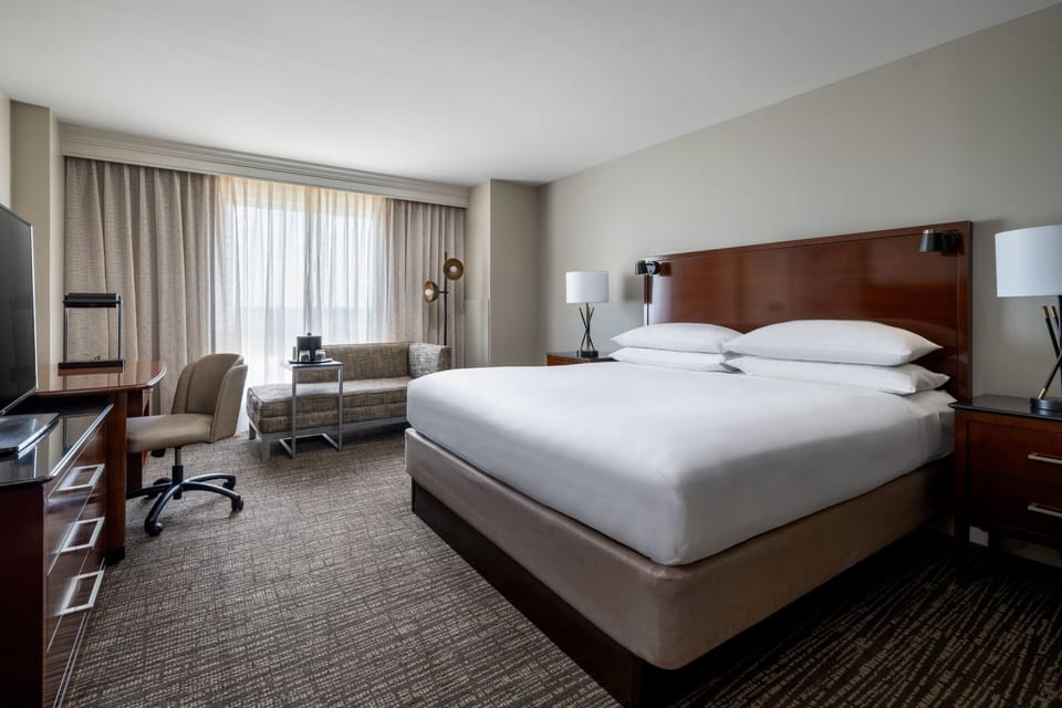 Premium bedding, Select Comfort beds, desk, blackout drapes