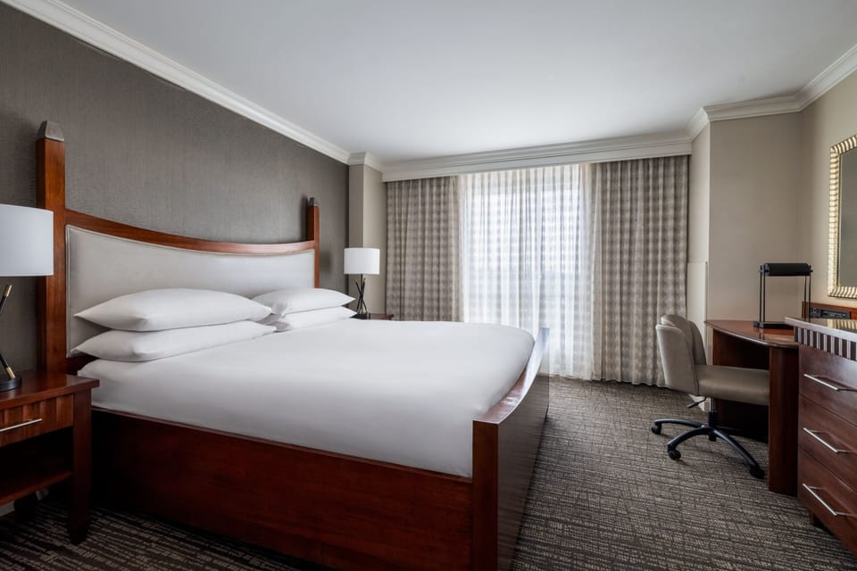Premium bedding, Select Comfort beds, desk, blackout drapes