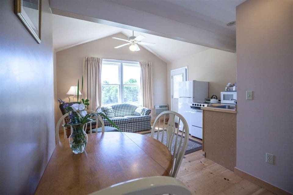 2 Bedroom Cottage, 1 King, 1 Queen, Sofa Bed | Living area | Flat-screen TV