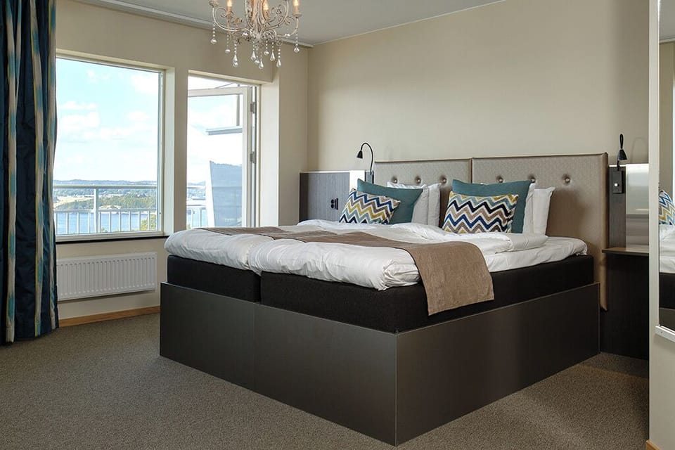 Junior Suite with Balcony | Blackout drapes, iron/ironing board, free WiFi, bed sheets