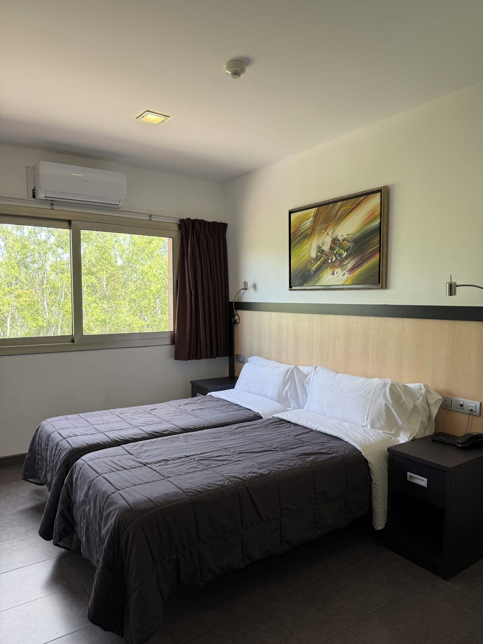 Twin Room | Down comforters, in-room safe, individually decorated