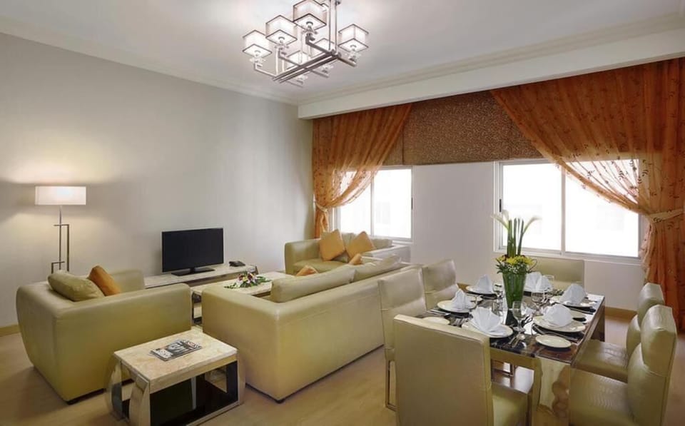 Family Apartment, 2 Bedrooms, City View | Living area | 32-inch flat-screen TV with satellite channels, TV