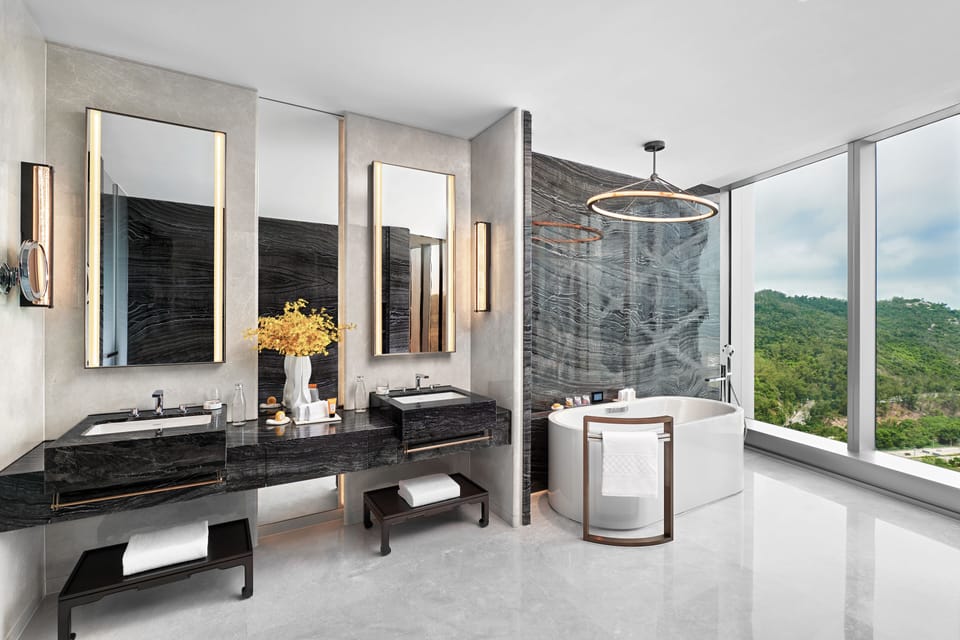 Nüwa Villa | Bathroom | Separate tub and shower, free toiletries, hair dryer, bathrobes