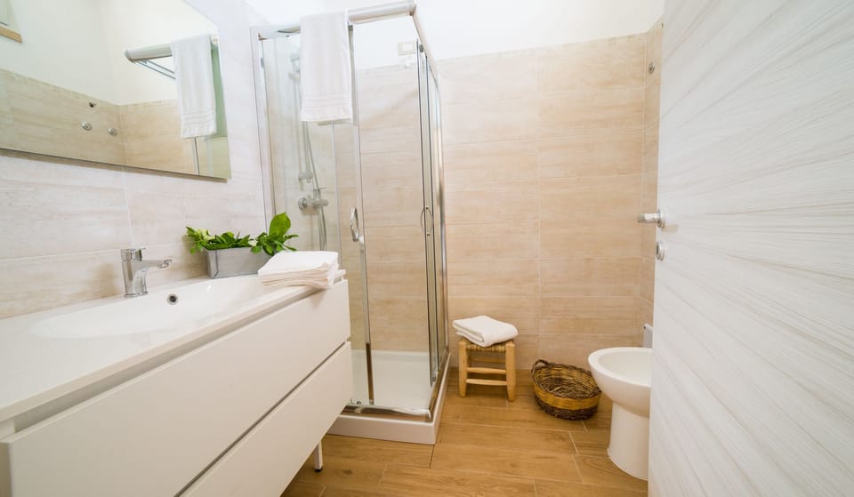 Bathroom | Shower, rainfall showerhead, bathrobes, bidet