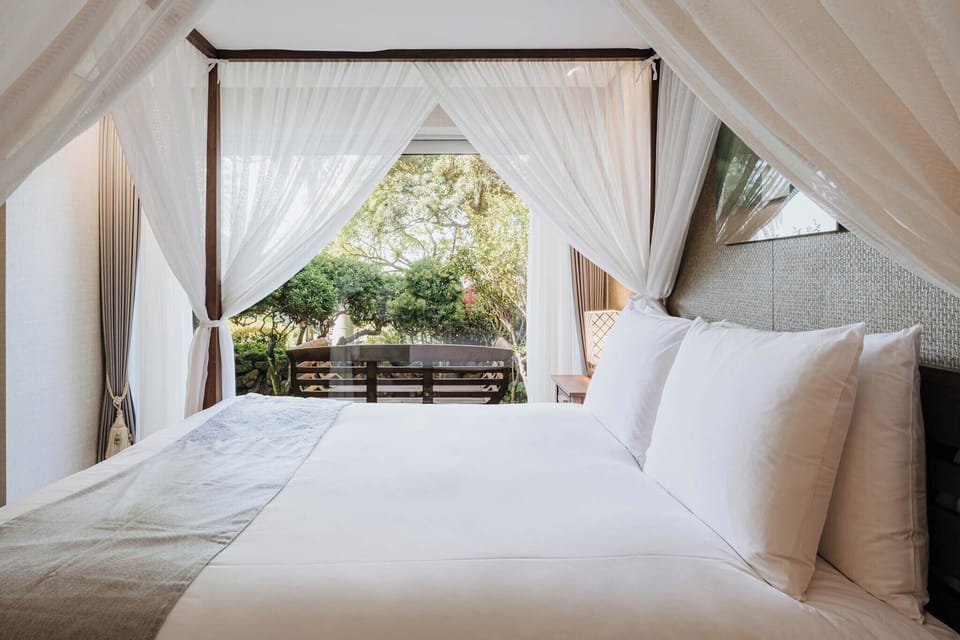 Romantic Canopy Suite, Private Pool | Premium bedding, down comforters, free minibar items, in-room safe