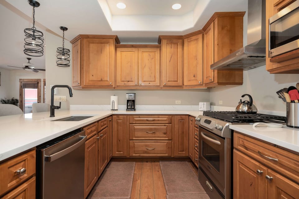 Fully equipped kitchen with stainless steel appliances