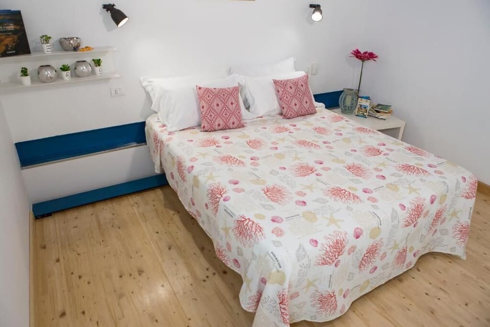 Family Quadruple Room | Minibar, individually decorated, individually furnished, desk